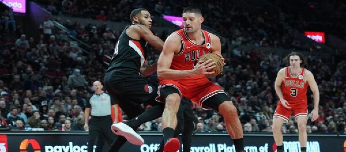 Vucevic hit a three-pointer at the buzzer to give the Bulls a narrow 122-121 victory over the Trail Blazers.
