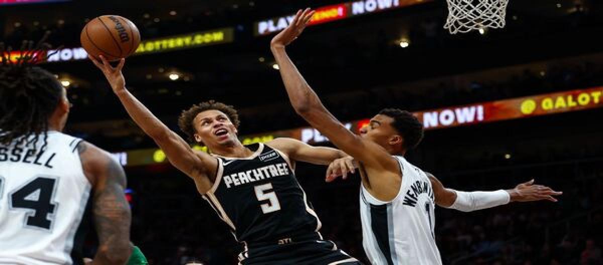 With 26 points and 12 rebounds, the Spurs defeated the Hawks 126-98.