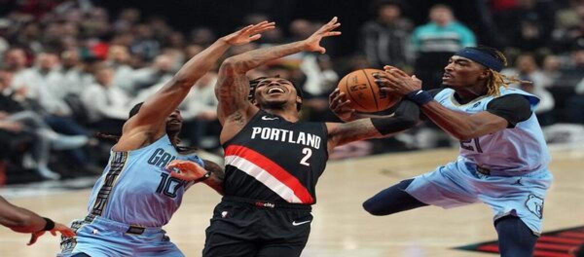 Grant's 29 points spurred the Trail Blazers to a 122-115 comeback victory over the Grizzlies.