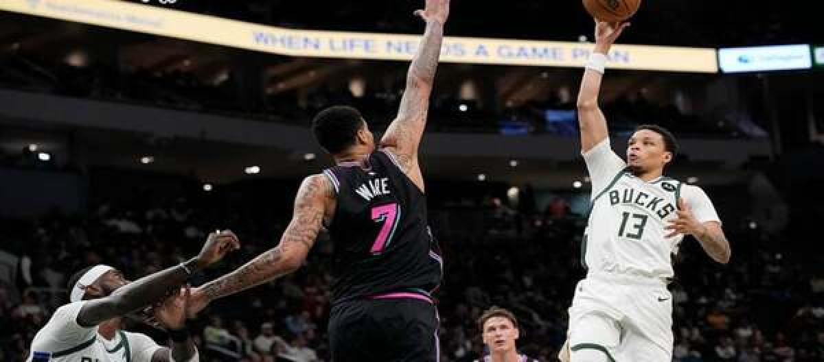 Porter exploded for 32 points in the final quarter, leading the Bucks to a 128-117 comeback victory over the Heat.