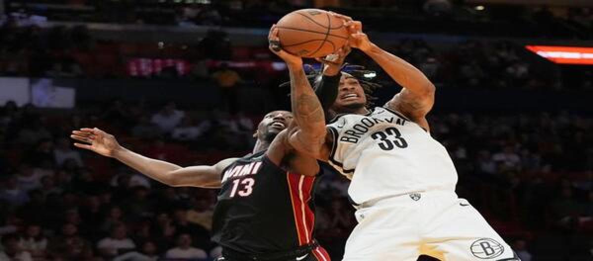 Bam Adebayo led the Heat to a 124-98 victory over the Nets, with Bam Adebayo scoring 23 points.