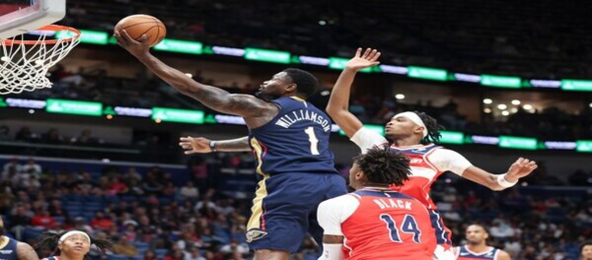 Johnson's 20 points weren't enough to save the Pelicans from a 138-118 victory over the Wizards.