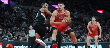 Vucevic hit a three-pointer at the buzzer to give the Bulls a narrow 122-121 victory over the Trail Blazers.
